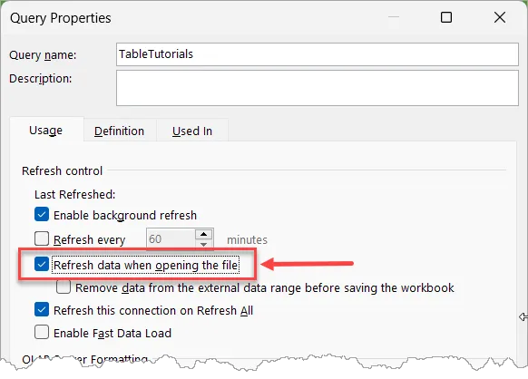 Query Properties dialog box with a checkmark next to "Refresh data when opening the file". The option is highlighted and an arrow points to it.